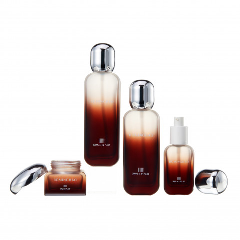 Wholesale Full Set Matte Brown Glass Bottle Electroplated Cap Cosmetic Package Bottle With Pump Skincare Lotion Spray Bottles
