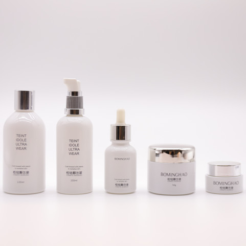 High Quality White Color Round Shape Cosmetic Airless Bottle Unique 30ml Cosmetic Packaging Glass Bottle