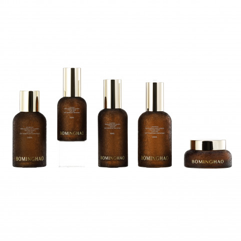 OEM ODM Brown Textured Glass Bottle Round Shape Cosmetic Airless Bottle Cosmetic Packaging Set Glass Bottle With Gold Cap